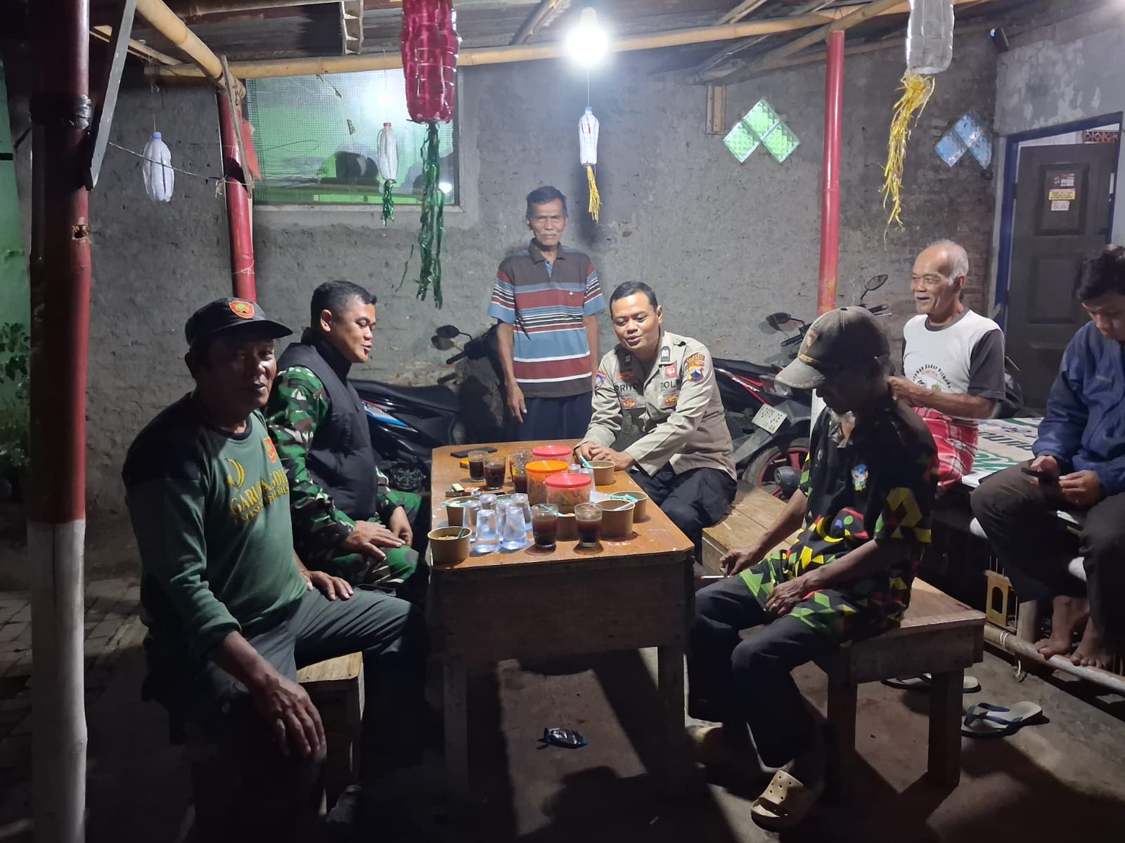 Sambang Satkamling, Bhabinkamtibmas Perkuat Kemitraan dengan Warga Bancarkembar